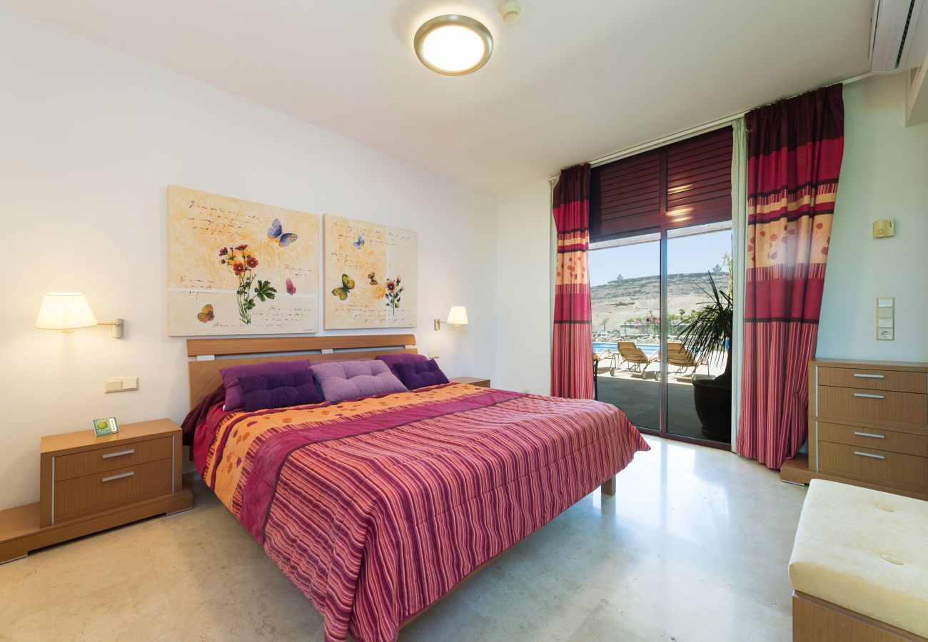 Chalet à Mogán - Piscina privada climatizada en entorno tranquilo y vistas al mar en campo de golf