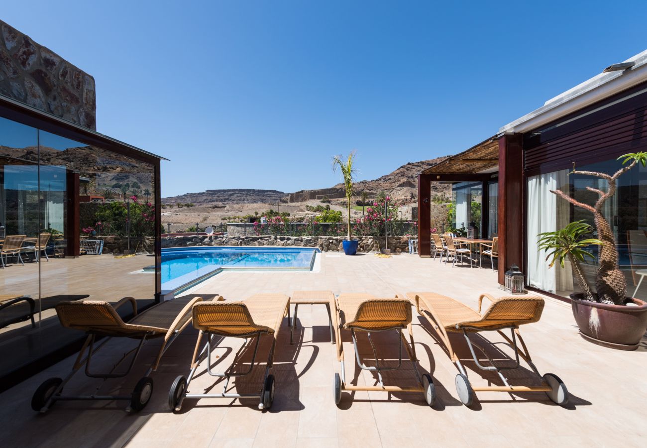 Chalet à Mogán - Piscina privada climatizada en entorno tranquilo y vistas al mar en campo de golf