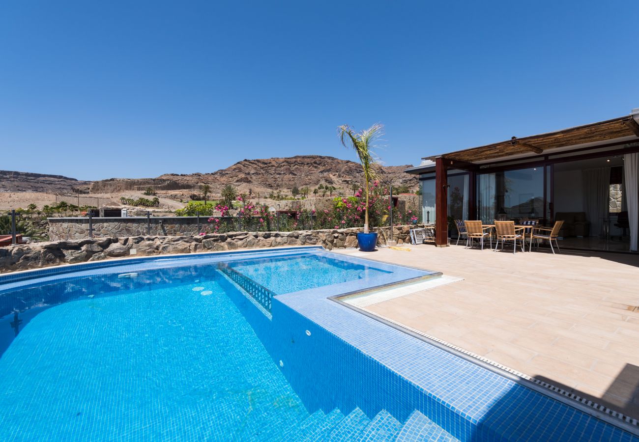 Chalet à Mogán - Piscina privada climatizada en entorno tranquilo y vistas al mar en campo de golf