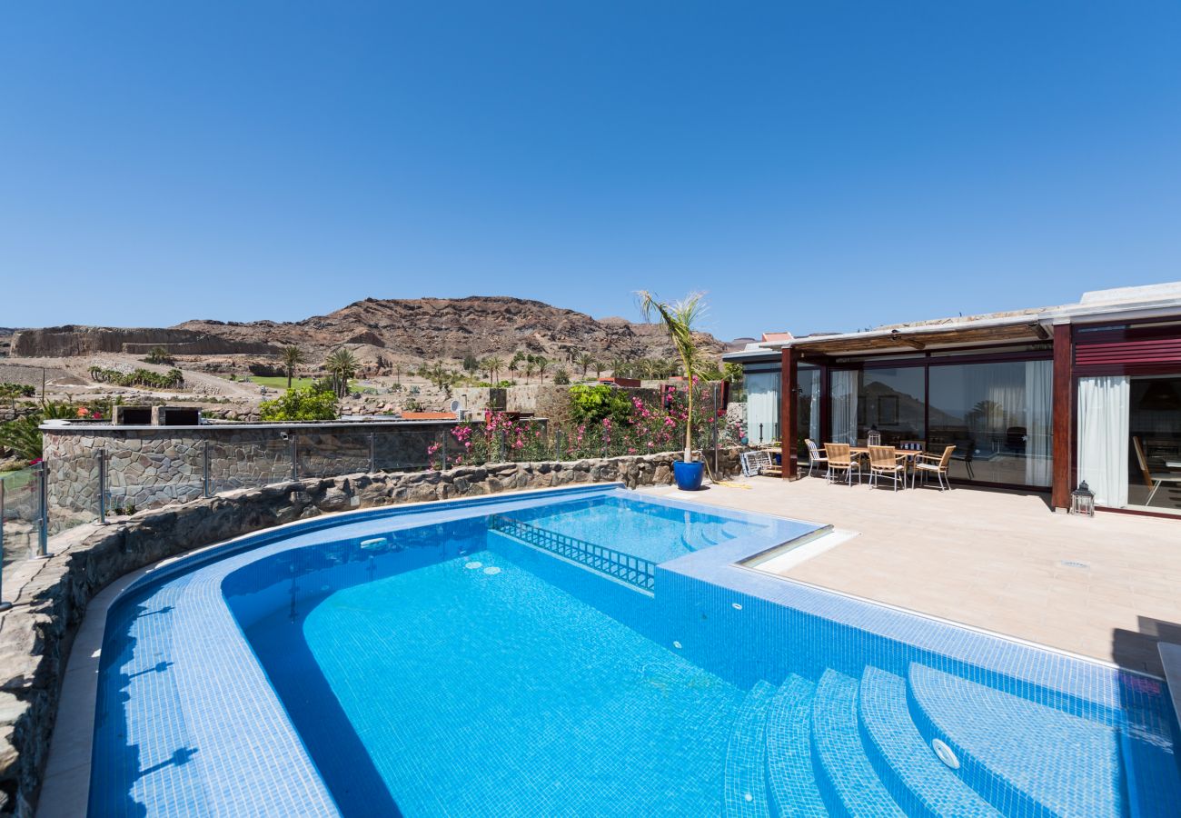 Chalet à Mogán - Piscina privada climatizada en entorno tranquilo y vistas al mar en campo de golf