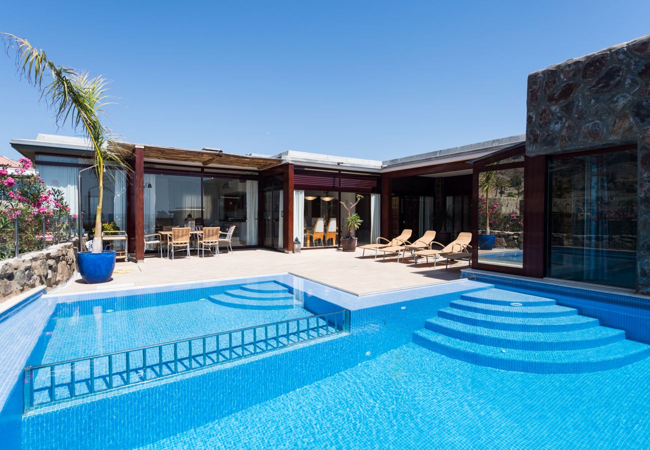 Chalet à Mogán - Piscina privada climatizada en entorno tranquilo y vistas al mar en campo de golf