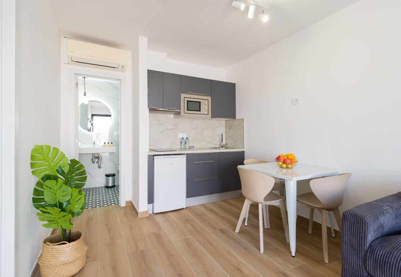 Appartement à Corralejo - Modern apartment. Swimming pool and terrace. Right on the beach in Corralejo - Home For Guest
