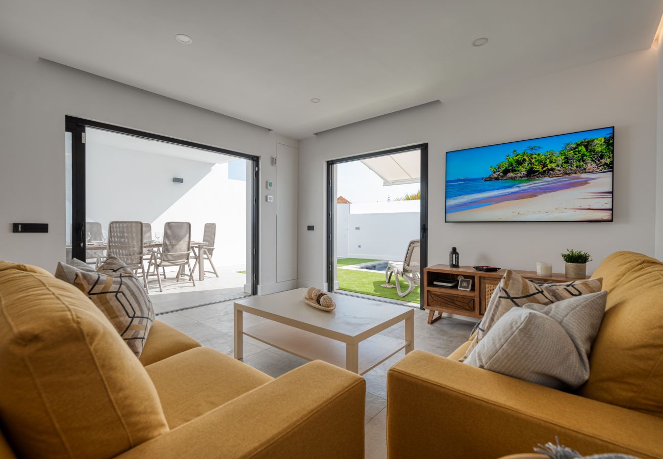 Living room of a refurbished house with private pool in Maspalomas